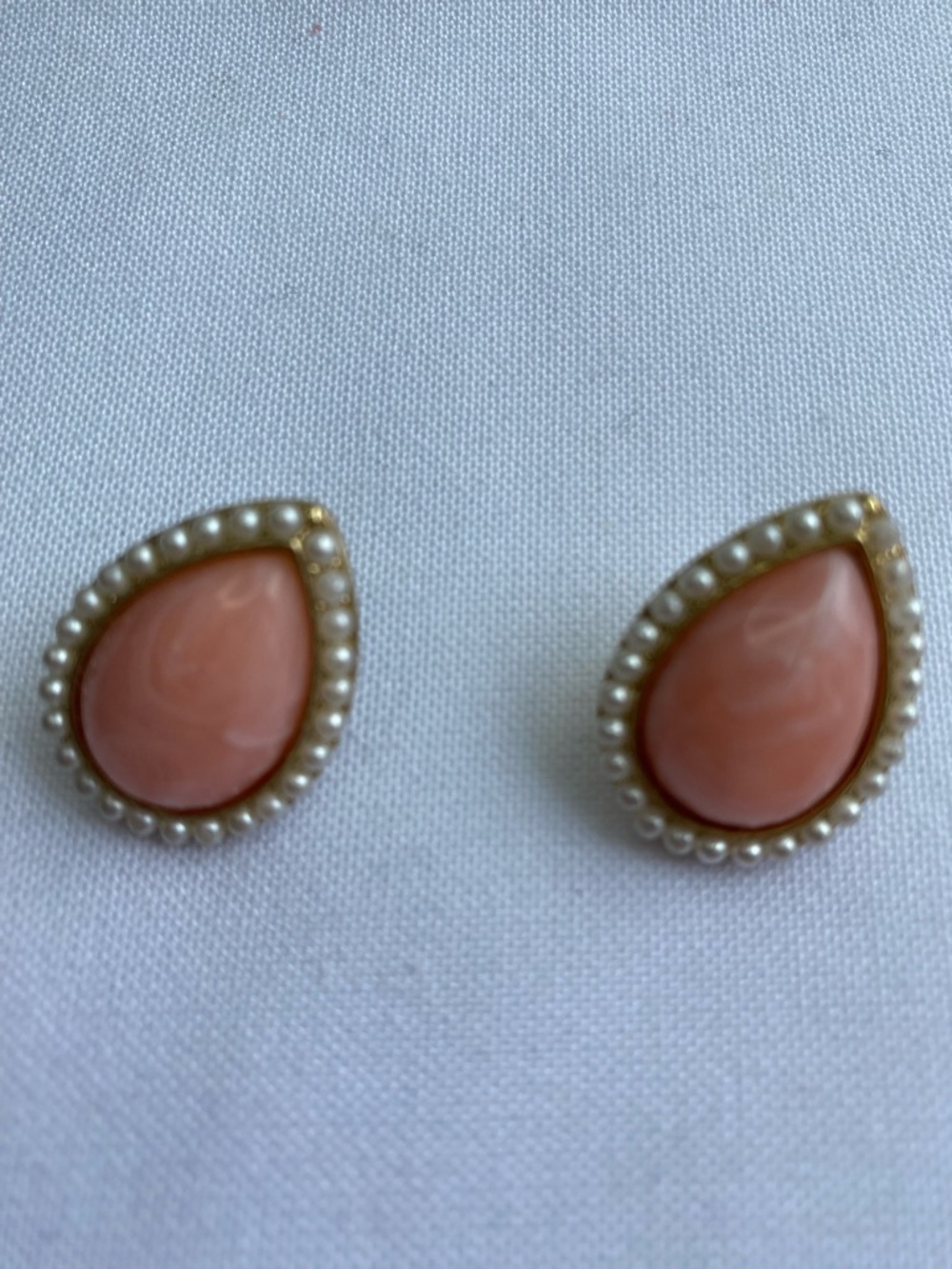 Vintage style stud earrings featuring teardrop shaped faux pink stone earrings